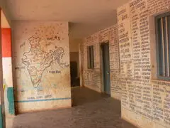 Primary School With Wall Writing And Map